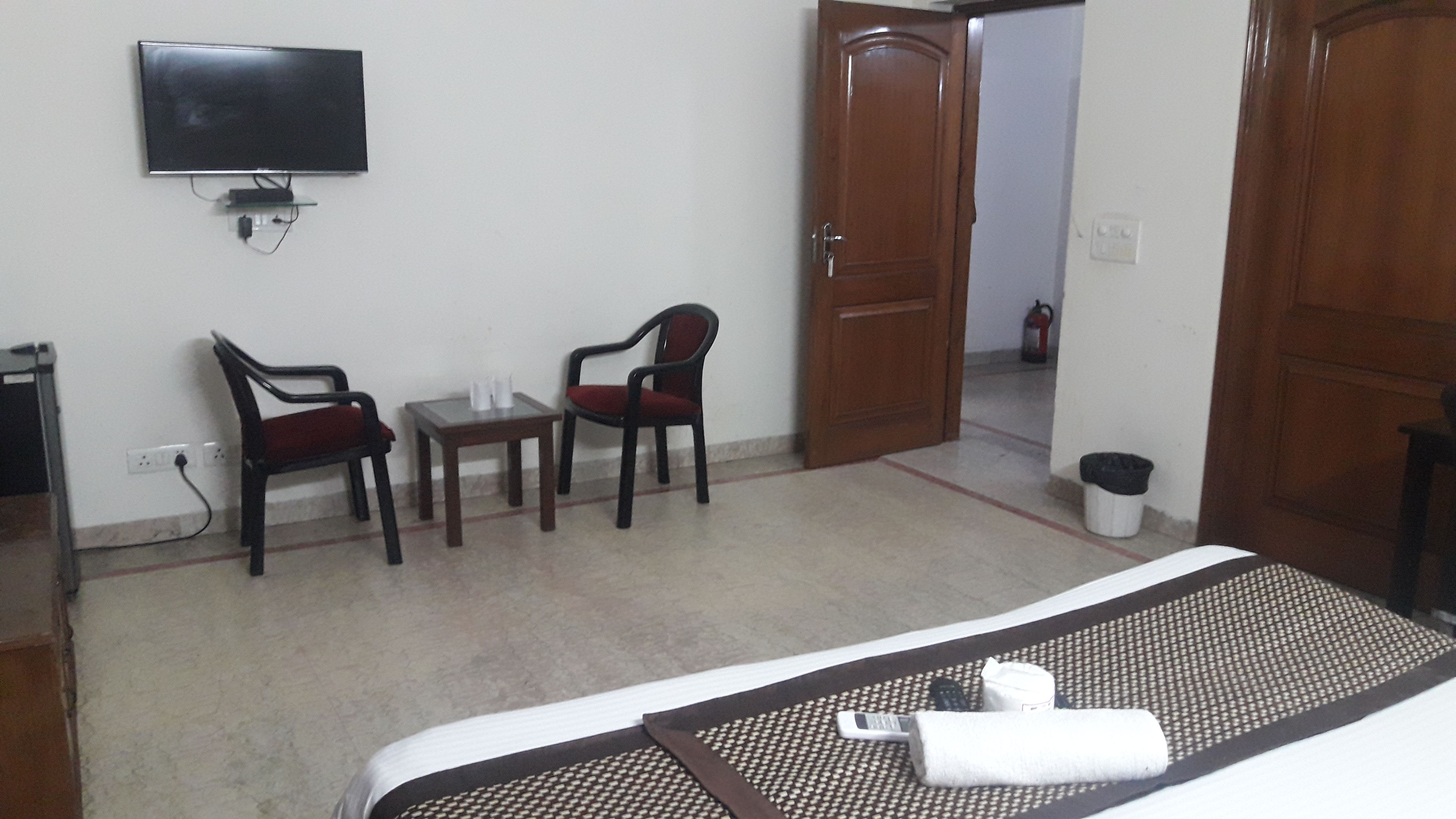 photo by the patient & attendant's room at the guesthouse during the treatment in India